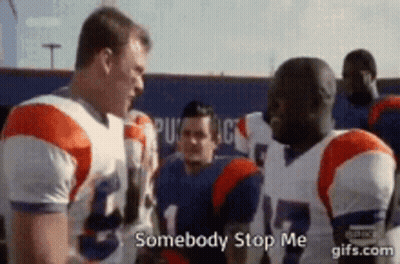 Two Football Players Are Talking To Each Other And One Of Them Is Saying Somebody Stop Me GIF