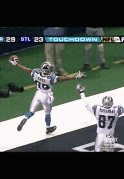 Two Football Players Celebrate A Touchdown During A Game Between The Panthers And The Jets GIF