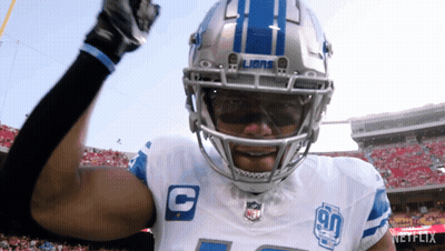 Two Football Players Celebrating Touchdown GIF