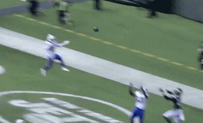 Two Football Players Fighting Number 5 Jersey GIF