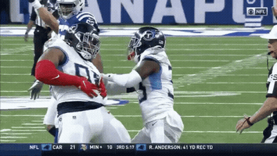 Two Football Players Fighting With Referee GIF