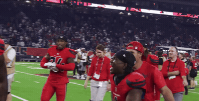 Two Football Players Hugging Number 2 Jersey GIF
