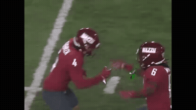 Two Football Players Hugging Number 4 Jersey GIF