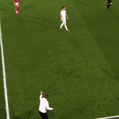Two Football Players Hugging On Field, Number 4 Jersey GIF