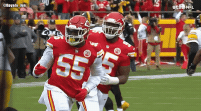 Two Football Players In 55 Jerseys GIF