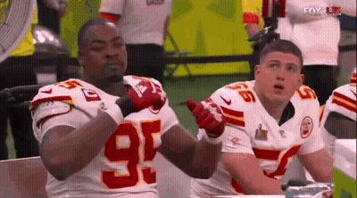 Two Football Players In Number 96 Jerseys GIF