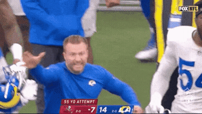 Two Football Players In Red Jerseys With Bosa 97 GIF