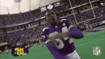 Two Football Players In Red Uniforms Number 15 GIF