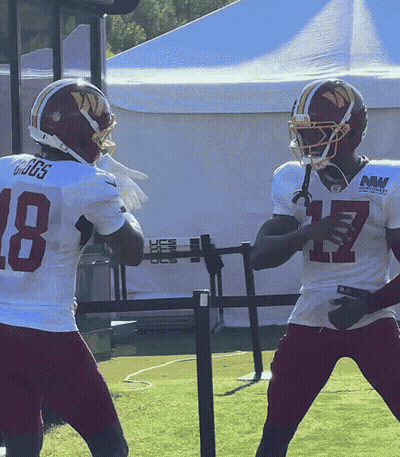 Two Football Players Number 18 GIF