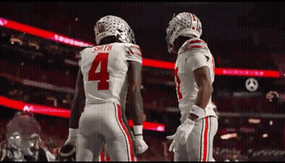 Two Football Players Number 4 GIF