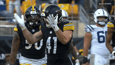 Two Football Players Number 50 And 41 Celebrating GIF