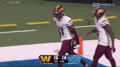 Two Football Players On A Field With Fox Divisional On The Bottom GIF