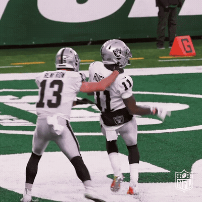 Two Football Players On Field Number 13 GIF