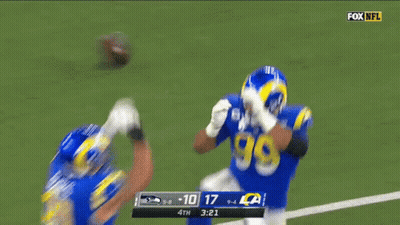 Two Football Players On Field With Fox NFL GIF