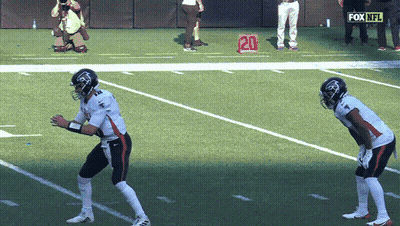 Two Football Players On Field With Fox NFL Logo GIF