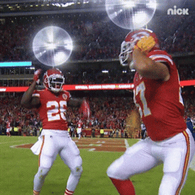 Two Football Players On Field With Nick Logo GIF