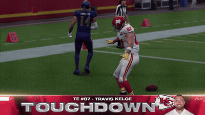 Two Football Players Running, One Wearing 87 GIF