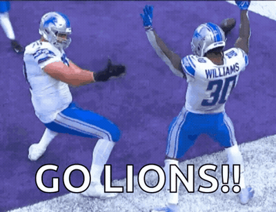 Two Football Players Saying Go Lions GIF