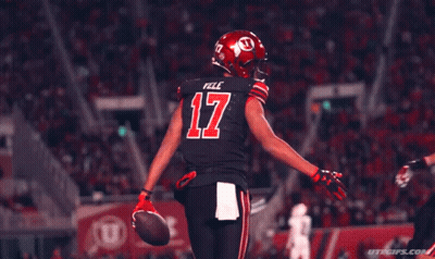 Two Football Players Shaking Hands GIF