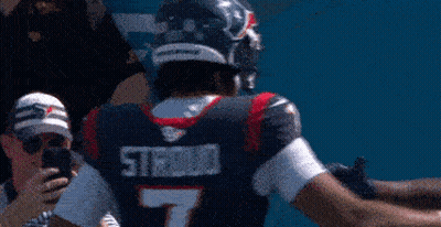 Two Football Players With Stroud On The Back Of Their Jersey Hugging Each Other GIF