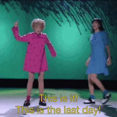 Two Girls Are Dancing In Front Of A Green Background With The Words This Is It And This Is The Last Day GIF