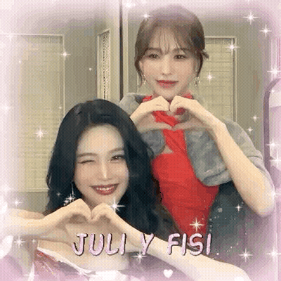 Two Girls Are Making A Heart With Their Hands . GIF