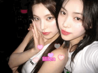 Two Girls Are Posing For A Picture And One Of Them Has The Name Lillen On Her Arm GIF