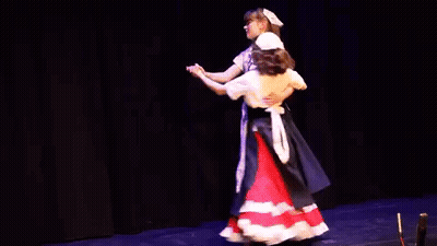Two Girls Dancing In Costumes GIF
