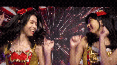 Two Girls Dancing In Front Of Fireworks Cinema GIF