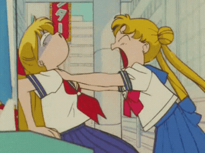 Two Girls Fighting In Front Of Sign GIF