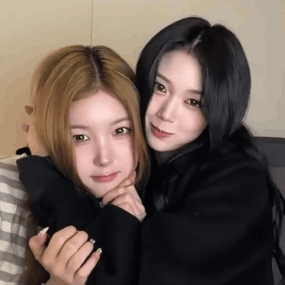 Two Girls Hugging One In Black Shirt GIF