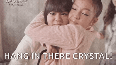 Two Girls Hugging With Hang In There Crystal GIF