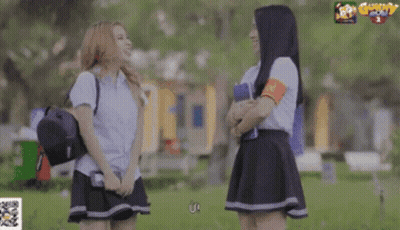 Two Girls In A Park With QR Code GIF