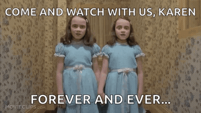 Two Girls In Blue Dresses Watching Together GIF