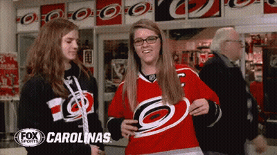 Two Girls In Carolina Hurricanes Jersey GIF