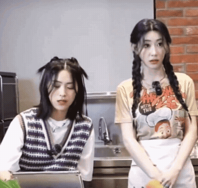 Two Girls In Kitchen One Wearing With You Shirt GIF
