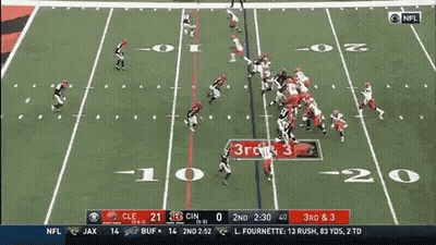 Two Girls Looking At Each Other Give The Ball To Nick Chubb GIF
