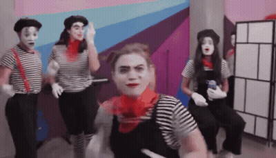Two Girls Looking In Mirror With Terror Sign GIF