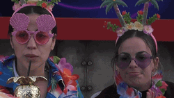 Two Girls Making Meh Face GIF