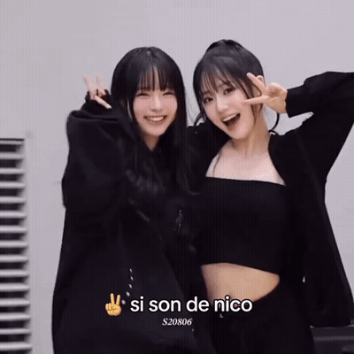 Two Girls Posing With Si Son De Nico GIF
