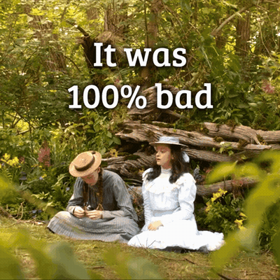 Two Girls Sitting In The Grass With The Words It Was 100 % Bad Below Them GIF