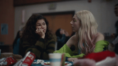 Two Girls Sitting With Coca Cola GIF