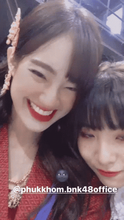 Two Girls Smiling For Picture @Phukkhom.bnk48office GIF