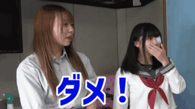 Two Girls Standing Next To Each Other One In School Uniform GIF