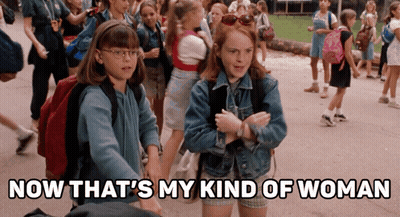 Two Girls Standing Next To Each Other With The Words Now That 'S My Kind Of Woman GIF