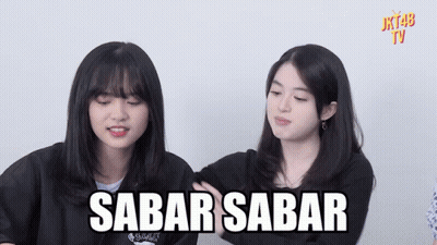 Two Girls Standing With Sabar Sabar GIF
