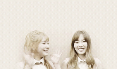 Two Girls Waving Hands GIF