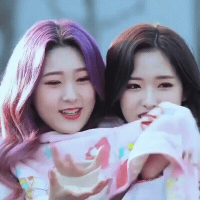 Two Girls With Purple Hair Smiling GIF