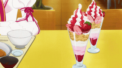 Two Glasses Of Ice Cream With Strawberries And Whipped Cream GIF