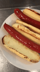 Two Glizzy Hotdog On Plate GIF